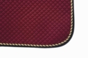 Mantilla acolchada con cord�n y ribete